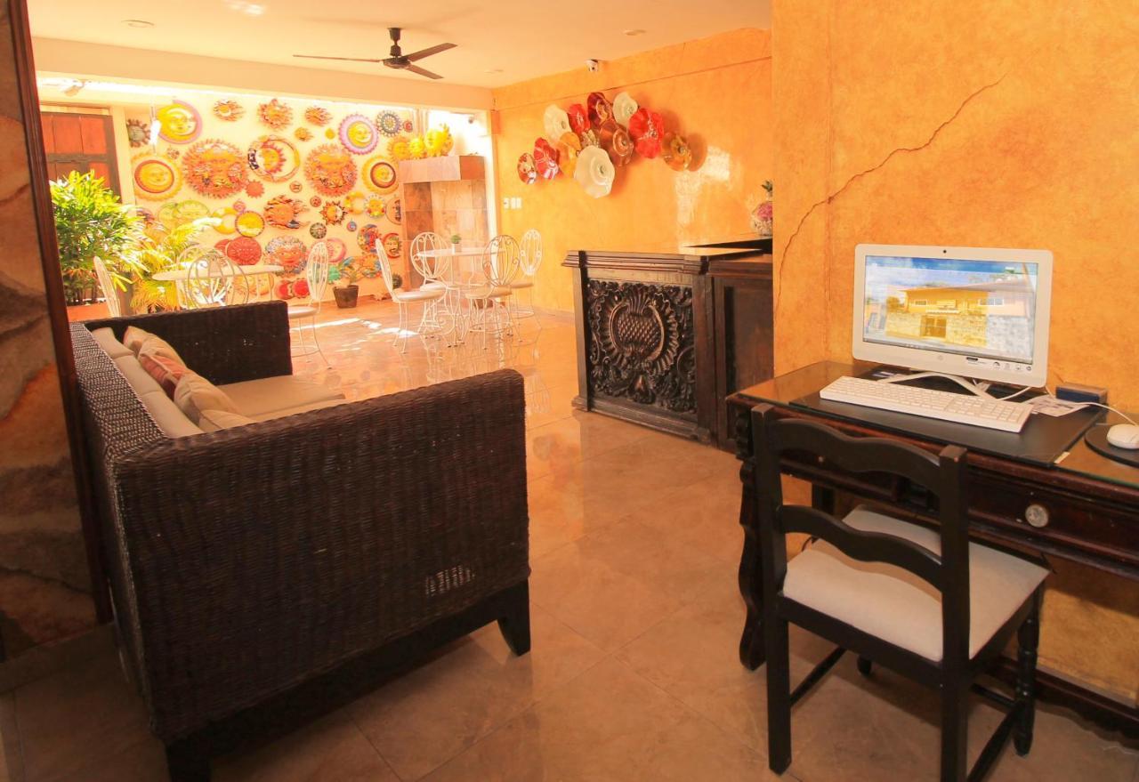 Papagayo Hotel Boutique Playa del Carmen Exterior foto The interior of a typical hotel room