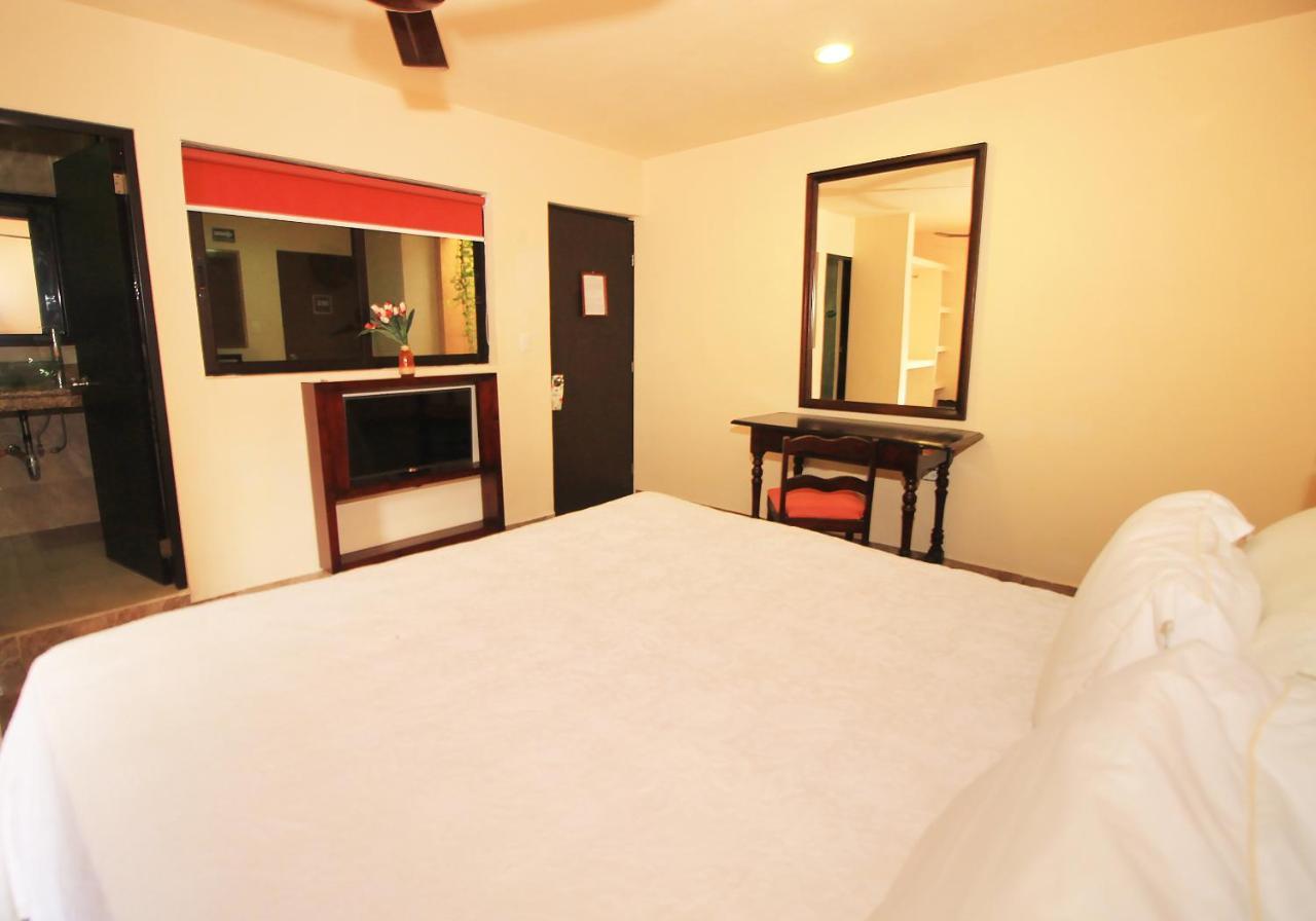 Papagayo Hotel Boutique Playa del Carmen Exterior foto A room at the hotel